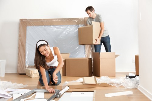 Professional removals team handling a Canary Wharf apartment move