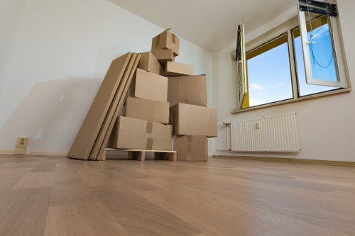 Secure Canary Wharf storage unit with labeled boxes and protected belongings