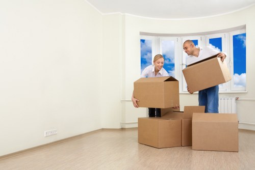 Professional movers handling apartment relocation in Canary Wharf