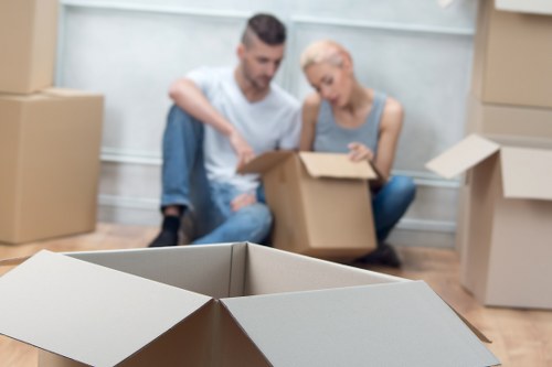 Professional movers handling furniture delivery in Canary Wharf
